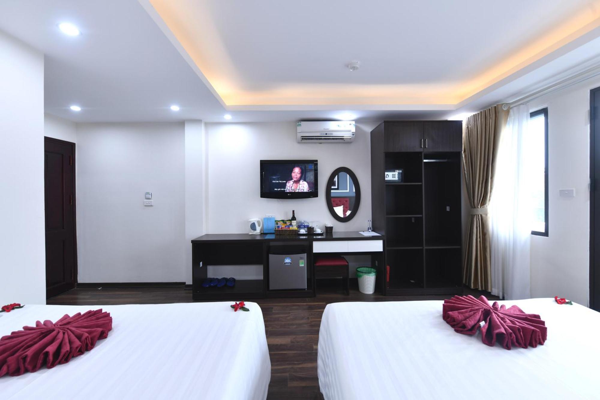 Hanoi Elpis Grand Hotel Quarto foto